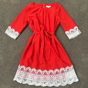 Girls, above knee length dress with lace trim